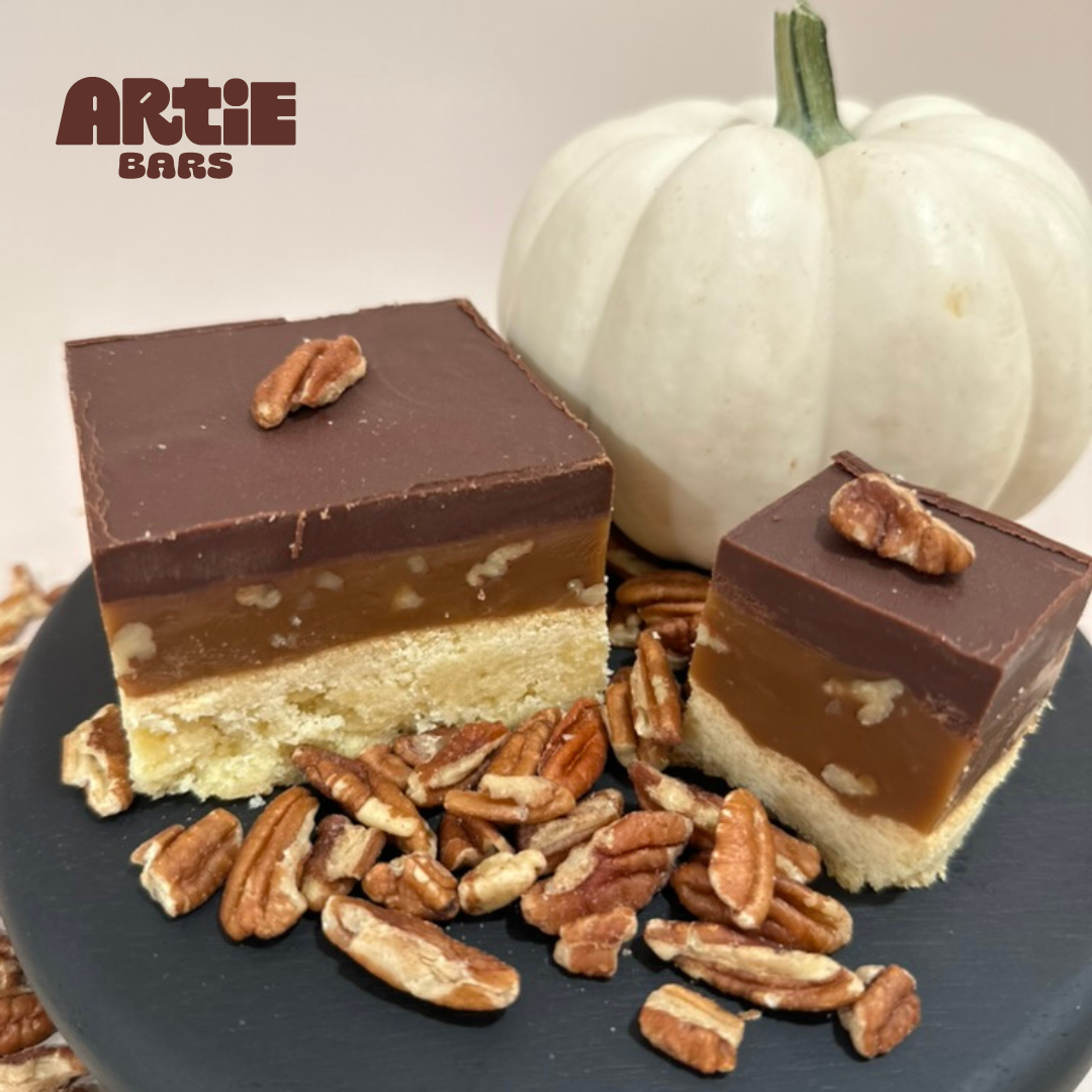 pecan dessert, toasted pecan bar, pecan shortbread, caramel pecan bar, chocolate ganache dessert, seasonal pecan treat, homemade baked goods, small batch desserts, buttery shortbread bars, pecan caramel chocolate, scratch-made dessert, Millionaire's shortbread, millionaire shortbread, handmade dessert, gourmet sweet snacks, gift, dessert gift, dessert, decadent chocolate treat, chocolate, ganache bars, baked goods, Artie Bars, treat yourself, small-batch sweets, scratch-made dessert, sweet treat gifts, bake