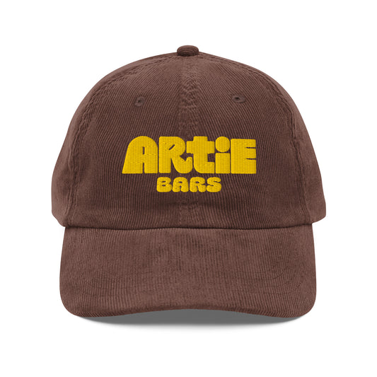 cotton corduroy cap, embroidered cap, adjustable strap hat, old-school cap, retro style hat, soft cotton cap, comfortable corduroy cap, vintage-inspired cap, gold buckle cap, sun protection cap, casual everyday hat, trendy corduroy hat, classic embroidered hat, stylish cap for all-day wear, Artie Bars Cap, Artie Bars Merch







